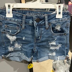 American Eagle Outfitters Women's Ripped Blue Jean Shorts